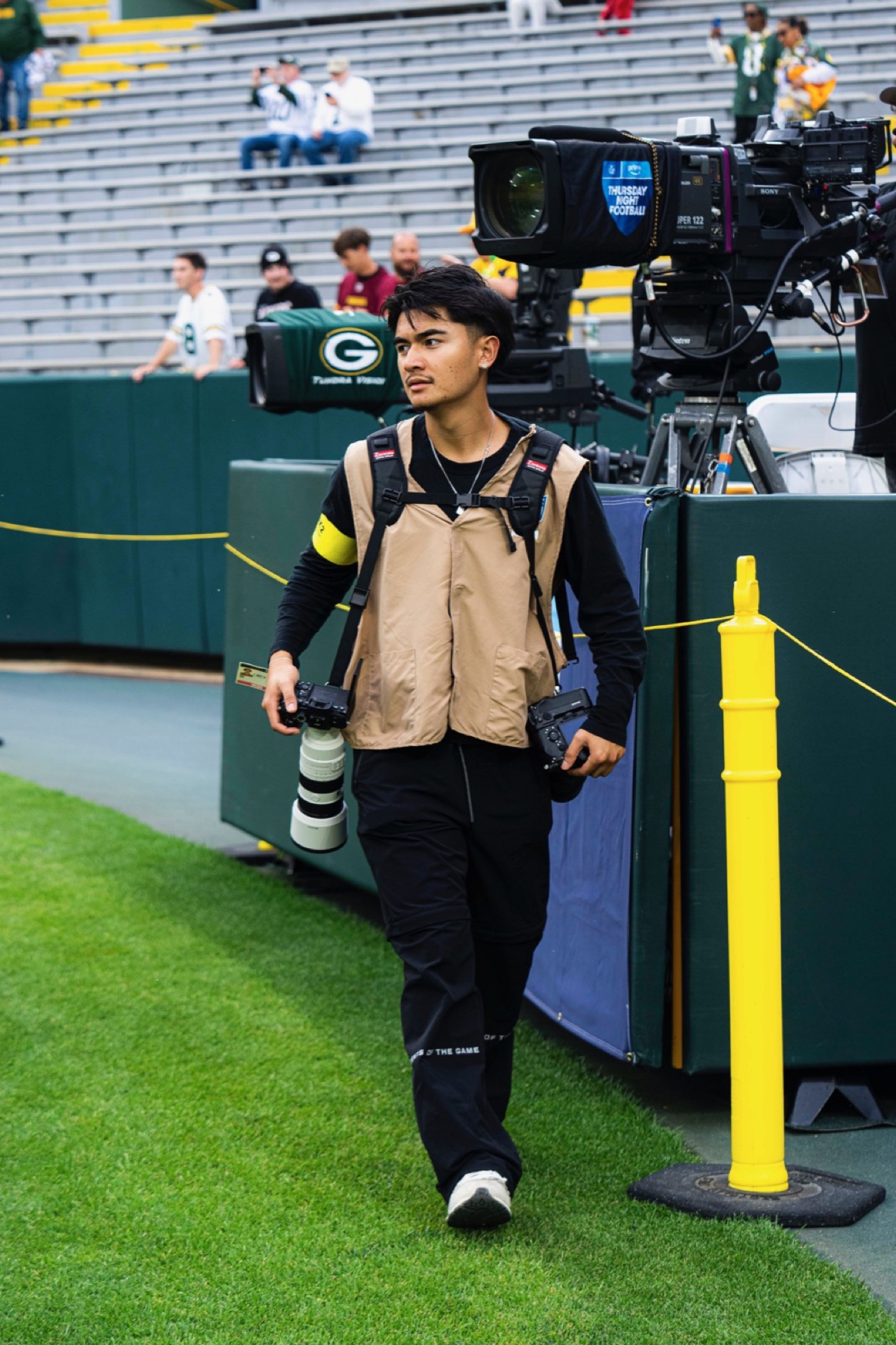 Paolo Dizon working behind the camera on set